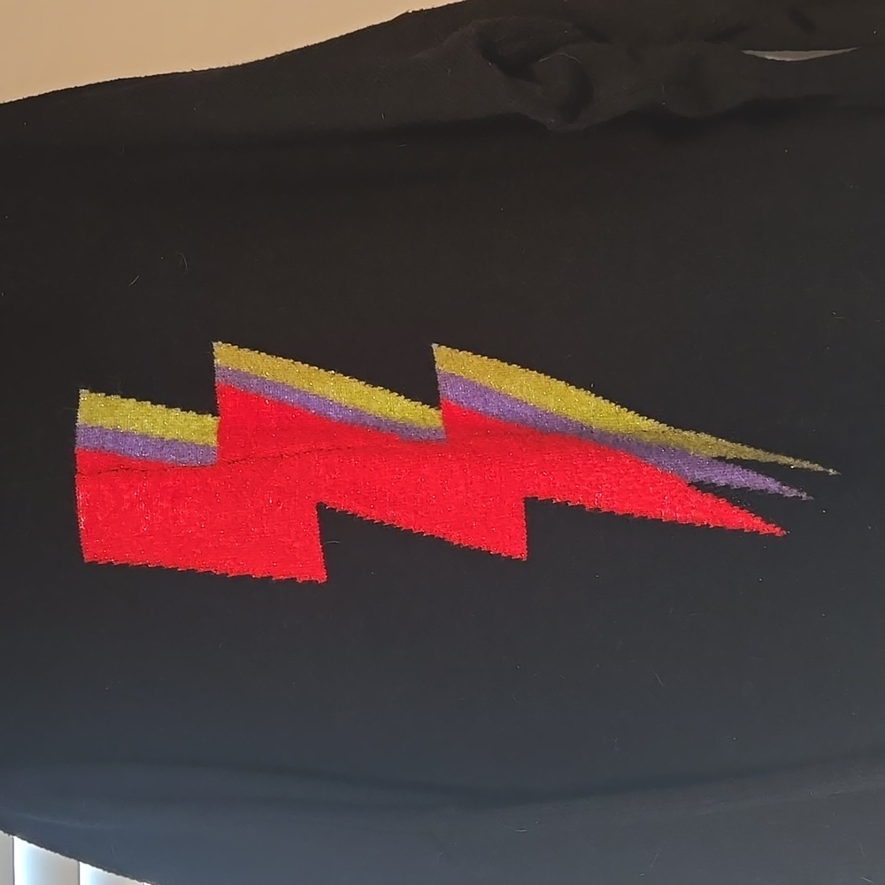 Dressed in Lala lightning bolt sweater